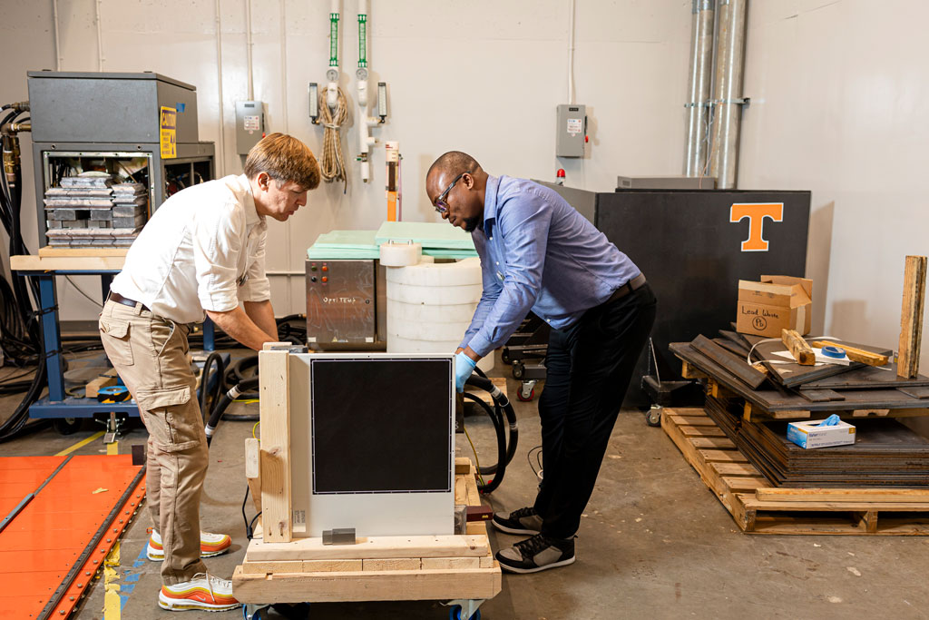 A detail photo of a Zeiss machine evaluating UT’s top left quadrant of the SEC logo